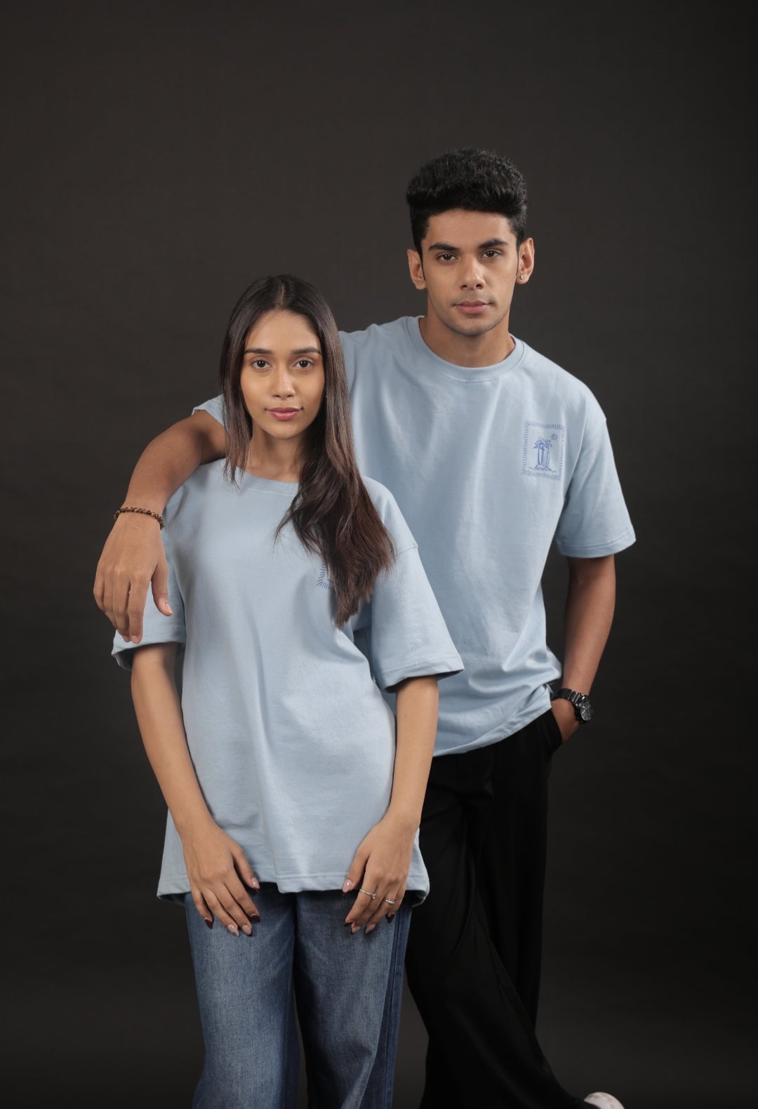 Matching Light Blue Oversized T-Shirts Matching Light Blue Oversized T-Shirts — Trendy Couple Outfit
