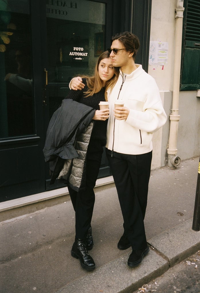 Monochromatic Black Knit With Cream Jacket, Close-Up Take Monochromatic Black Knit With Cream Jacket, Close-Up Take — Trendy Couple Outfit