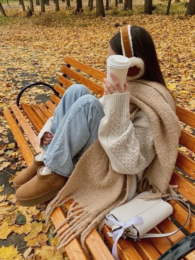 Cream Knit Sweater Paired with Light Blue Jeans Cream Knit Sweater Paired with Light Blue Jeans — Trendy Cozy Outfits