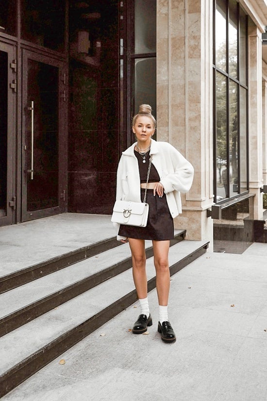 White Fuzzy Cropped Jacket Over Brown Top White Fuzzy Cropped Jacket Over Brown Top — Trendy Cozy Outfits