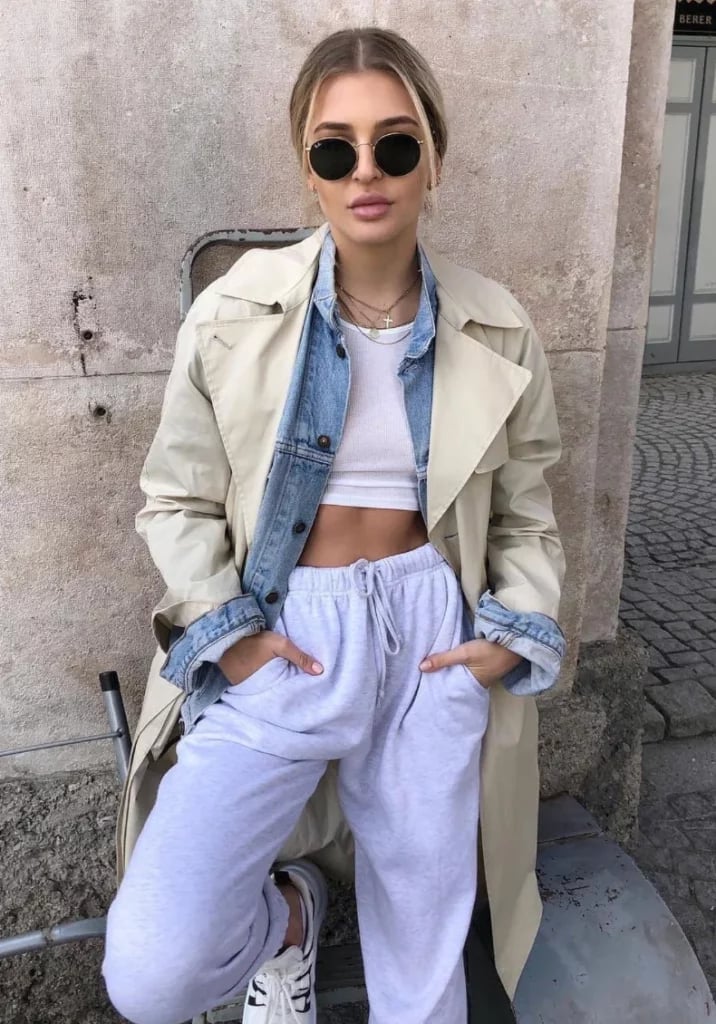 Beige Trench Coat Over Denim Jacket and Sweatpants Beige Trench Coat Over Denim Jacket and Sweatpants — Trendy Cozy Outfits