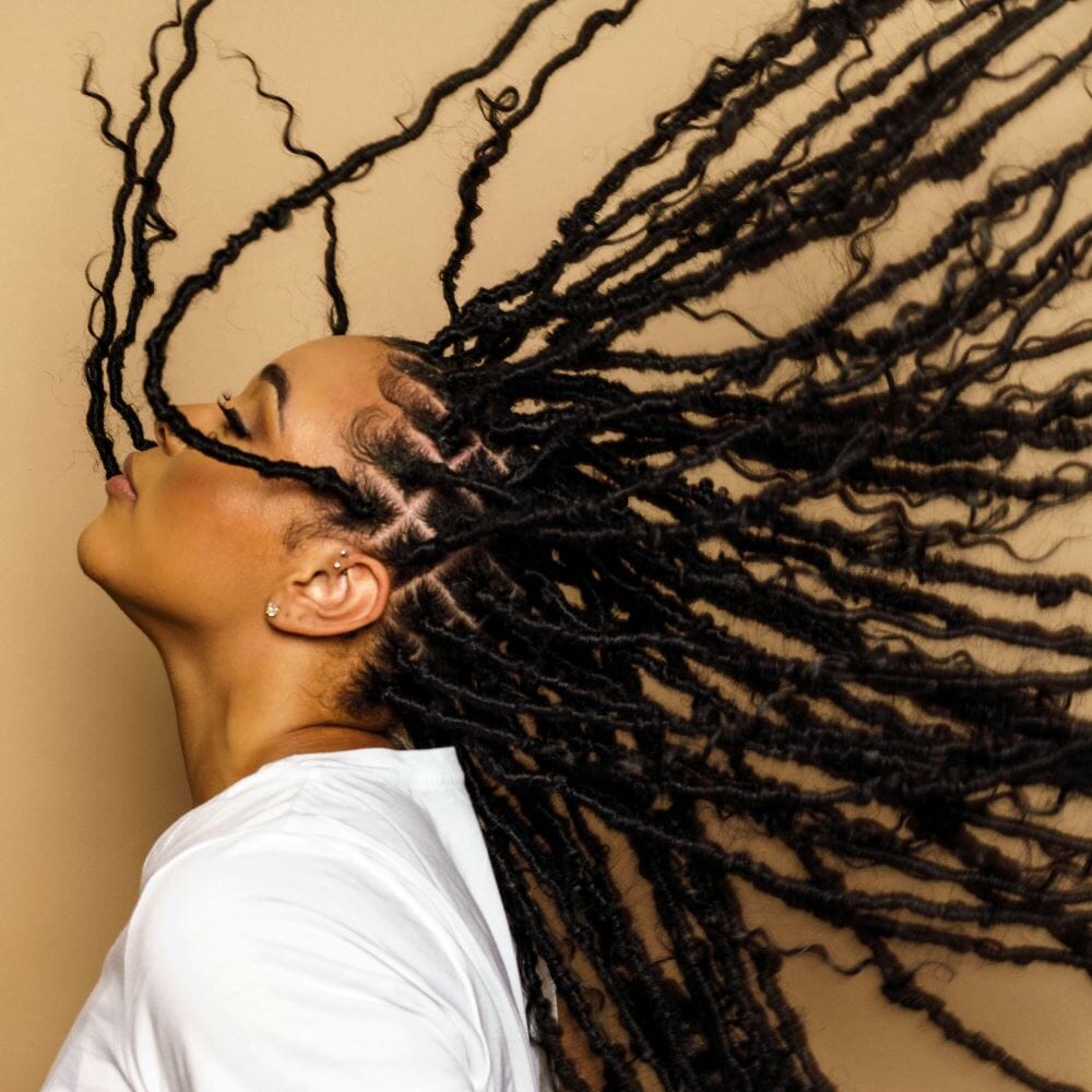 Mid-Back Butterfly Locs In Motion Mid-Back Butterfly Locs In Motion — Trendy Crochet Hair
