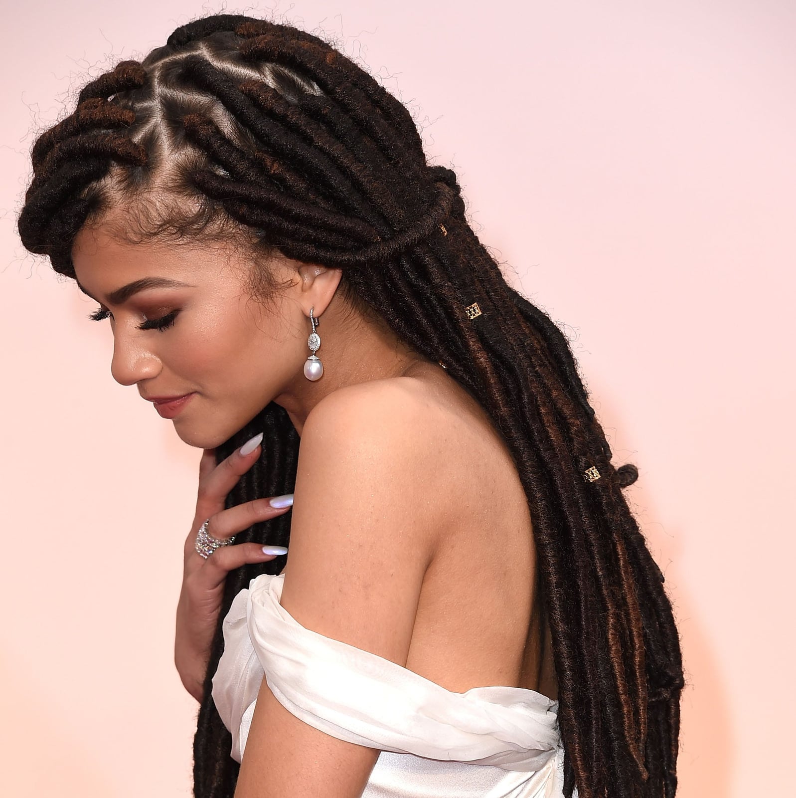 Mid-Back Faux Locs With Metallic Accents Mid-Back Faux Locs With Metallic Accents — Trendy Crochet Hair