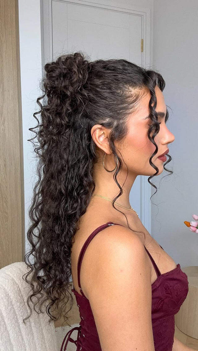 Mid-Back High Ponytail With Loose Tendrils Mid-Back High Ponytail With Loose Tendrils — Trendy Curly Hair Hairstyles