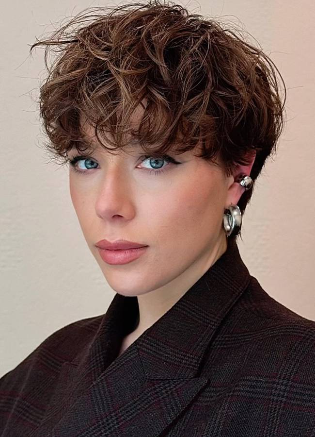 Textured Pixie Cut With Side Bangs Textured Pixie Cut With Side Bangs — Trendy Curly Hair Hairstyles