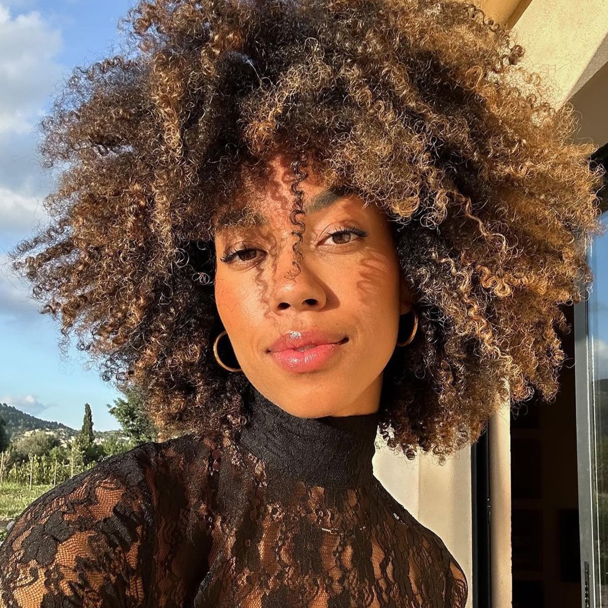 Shoulder Length Shag With Face-Framing Layers — Trendy Curly Hair Natural