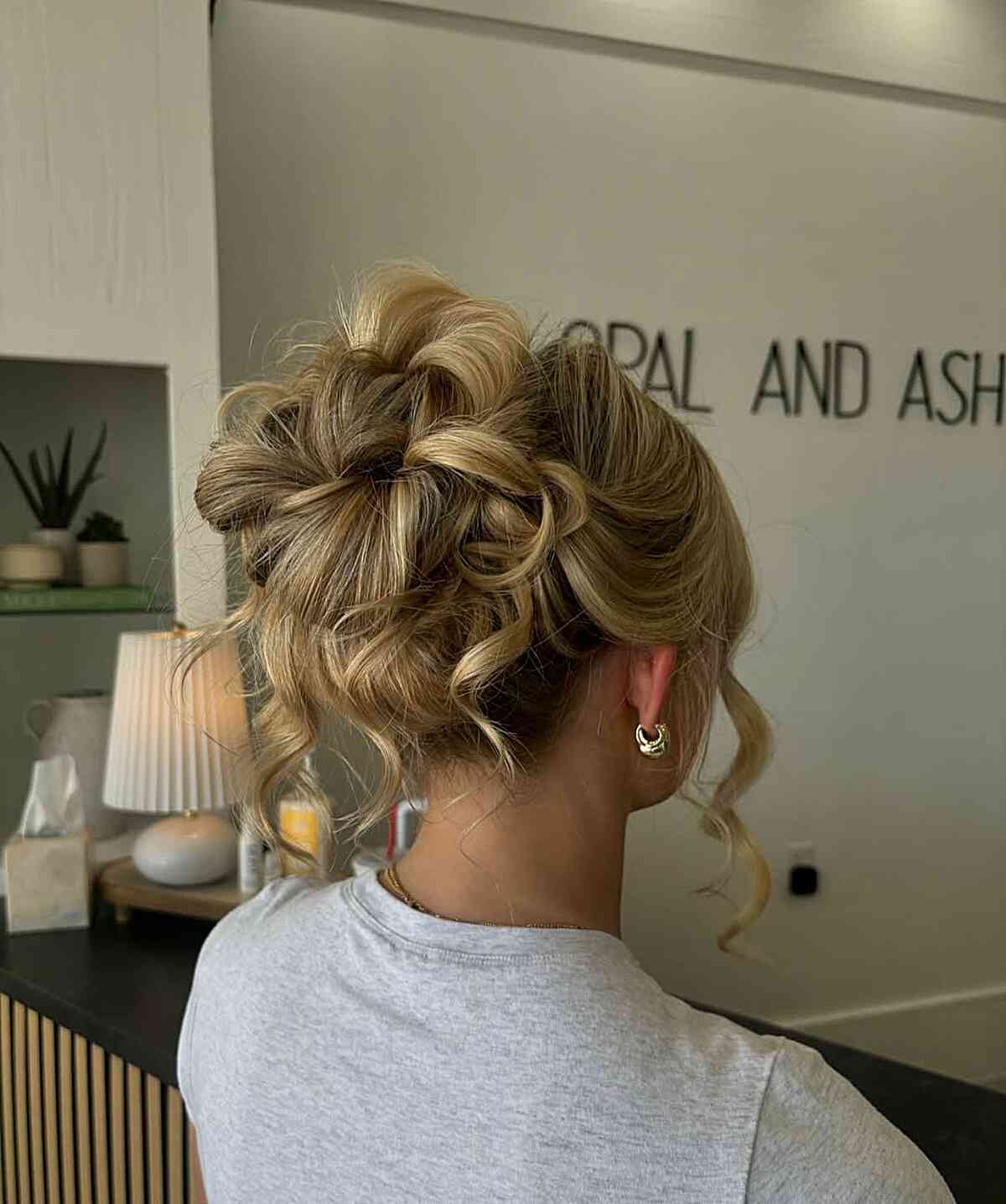 Voluminous Blonde Updo With Face-Framing Tendrils Voluminous Blonde Updo With Face-Framing Tendrils — Trendy Curly Updo