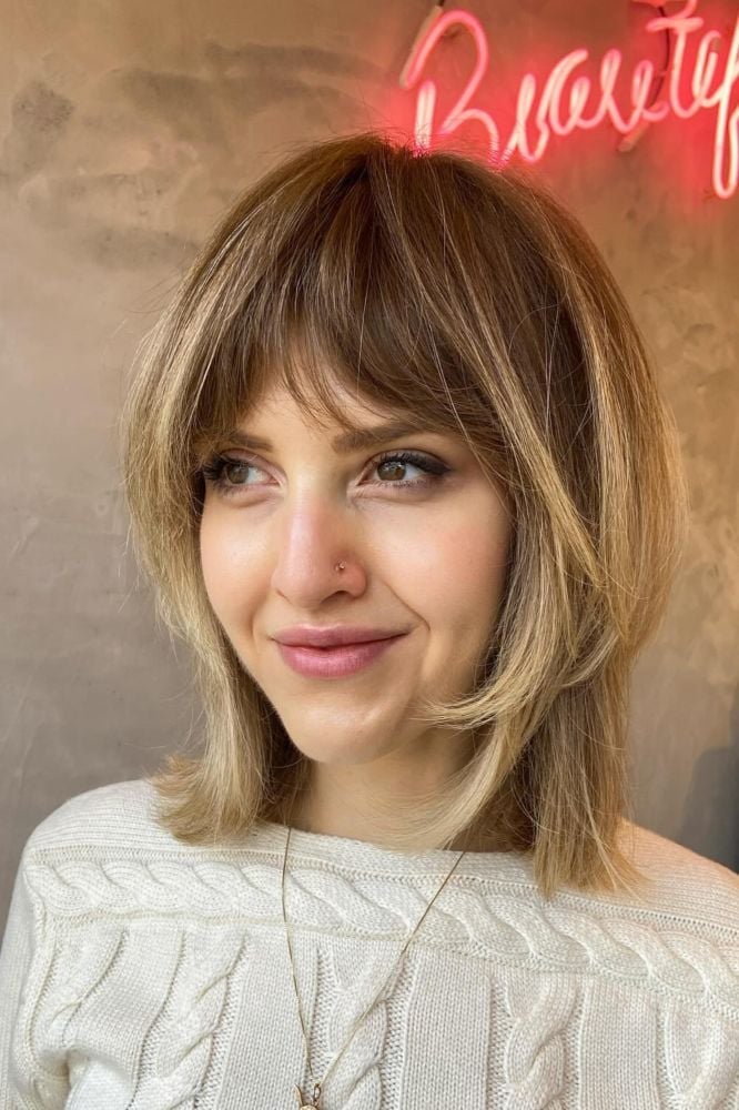 Honey Blonde Shag With Curtain Bangs — Trendy Cutting Bangs