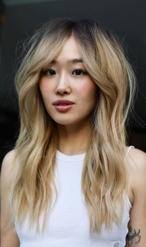 Mid-Back Blonde Layers With Curtain Bangs — Trendy Cutting Bangs