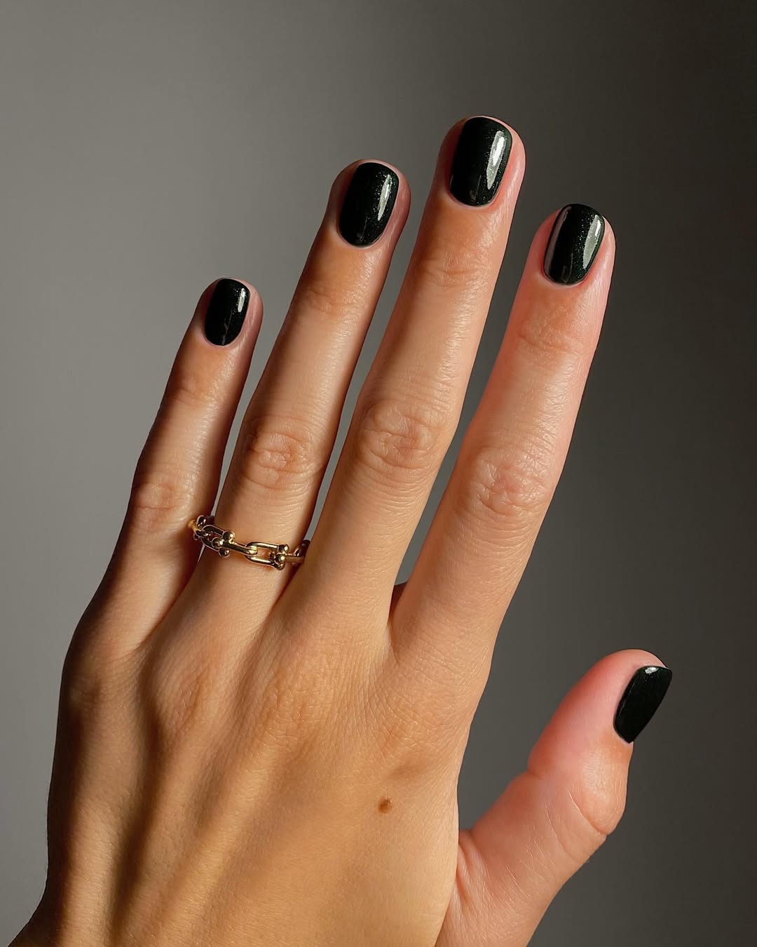 Short Oval Dark Green Shimmer Nails — Trendy Dark Nails