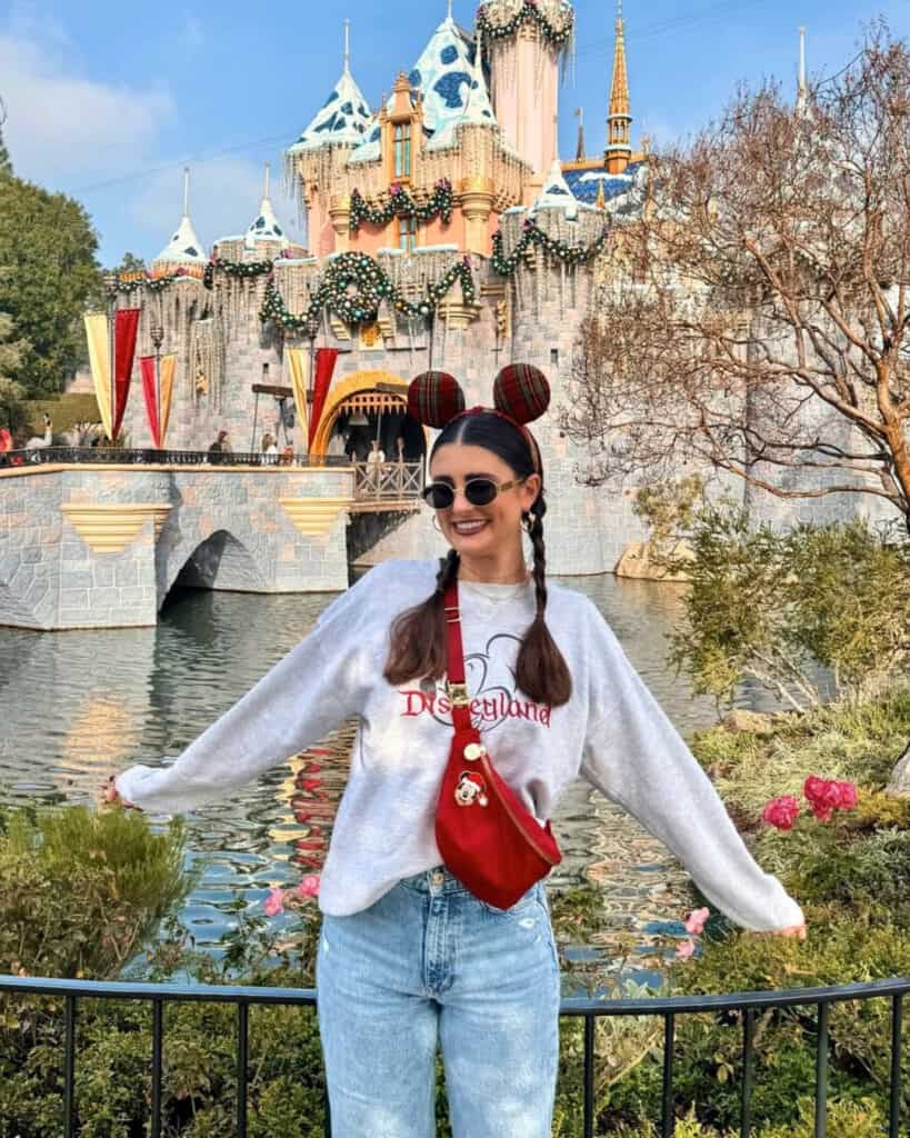Disneyland Crewneck Sweatshirt with Light Wash Jeans — Trendy Disney Outfits