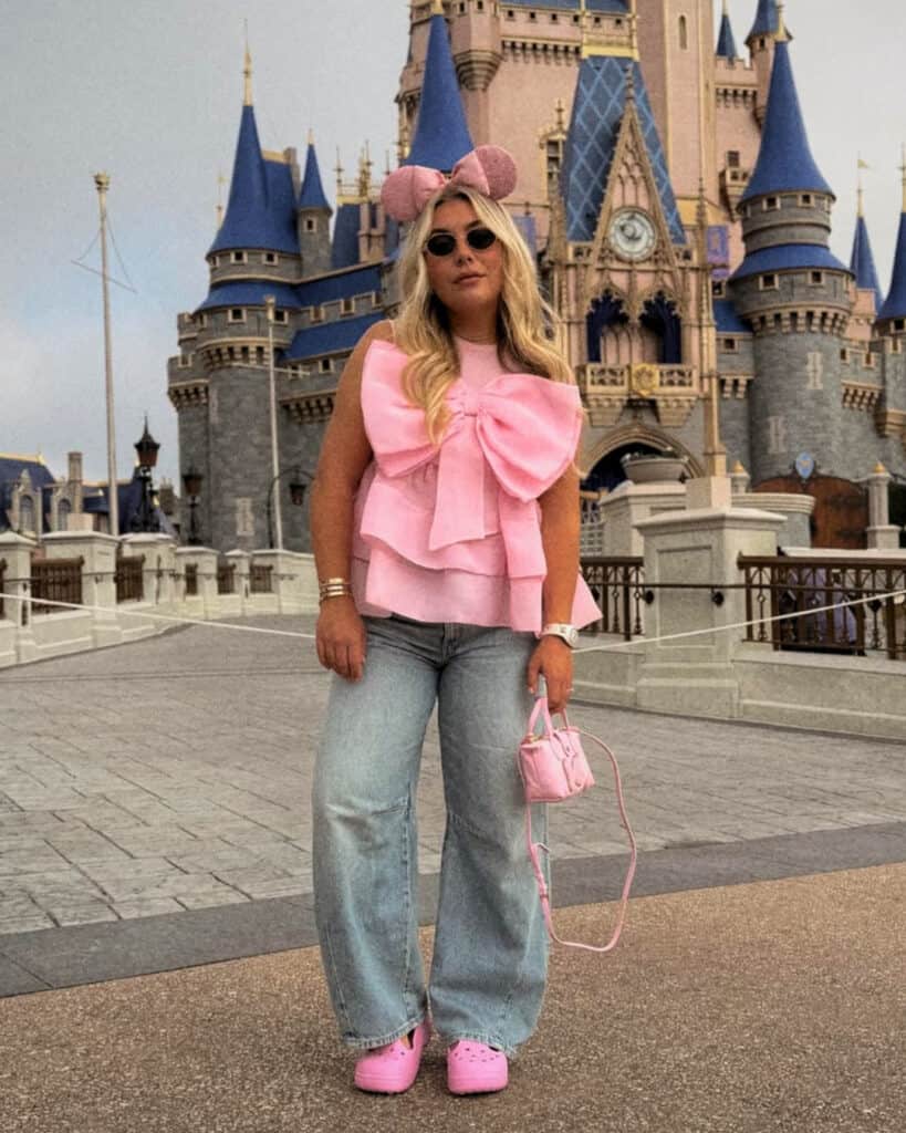 Pink Tiered Bow Top with Light Wash Wide Leg Jeans — Trendy Disney Outfits