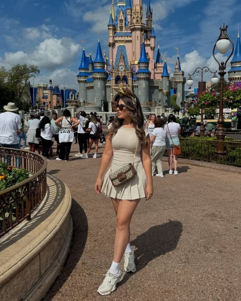 Beige Sleeveless Dress with Pleated Skirt — Trendy Disney Outfits