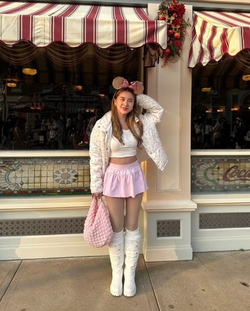 White Patterned Puffer Jacket with Pink Mini Skirt — Trendy Disney Outfits