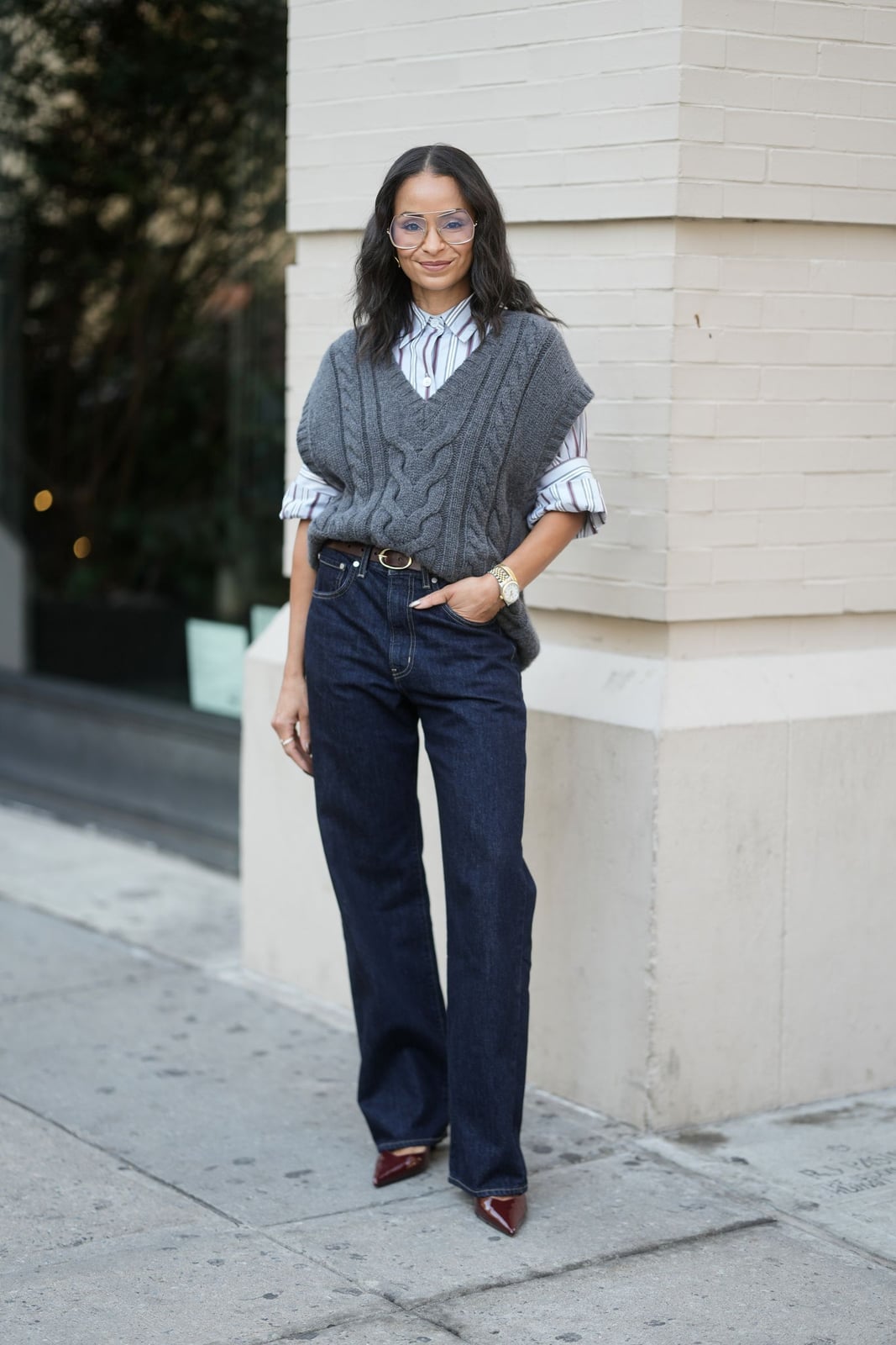 Cable Knit Vest Over Striped Shirt with Wide-Leg Jeans Cable Knit Vest Over Striped Shirt with Wide-Leg Jeans — Trendy Downtown Girl Outfits