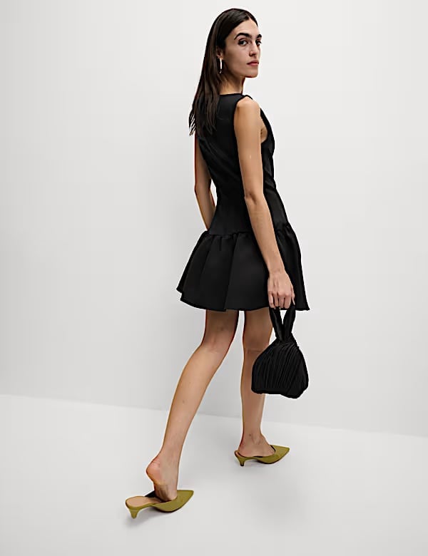 Black Sleeveless Drop Waist Mini Skater Dress Black Sleeveless Drop Waist Mini Skater Dress — Trendy Drop Waist Dresses