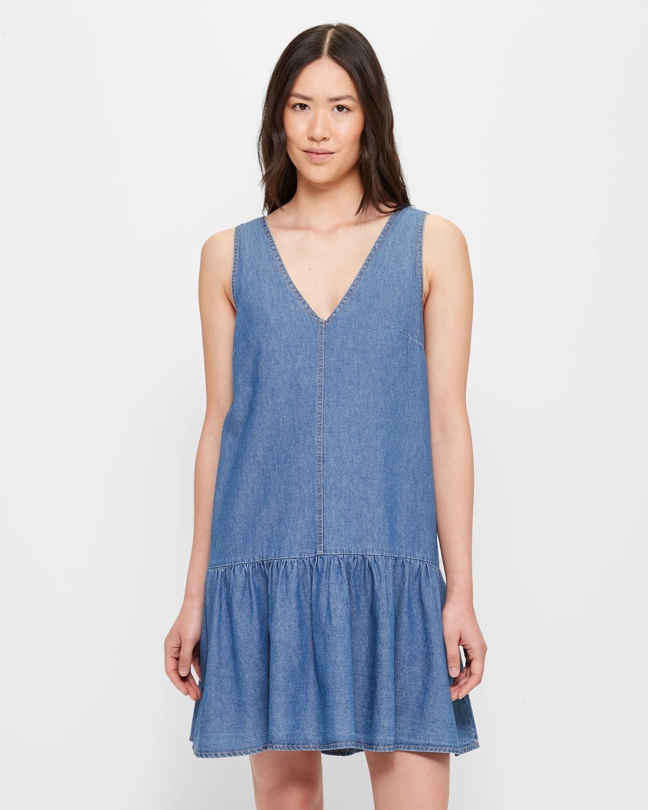 Medium Blue Denim Sleeveless Drop Waist Mini Dress Ruffled Hem Medium Blue Denim Sleeveless Drop Waist Mini Dress Ruffled Hem — Trendy Drop Waist Dresses
