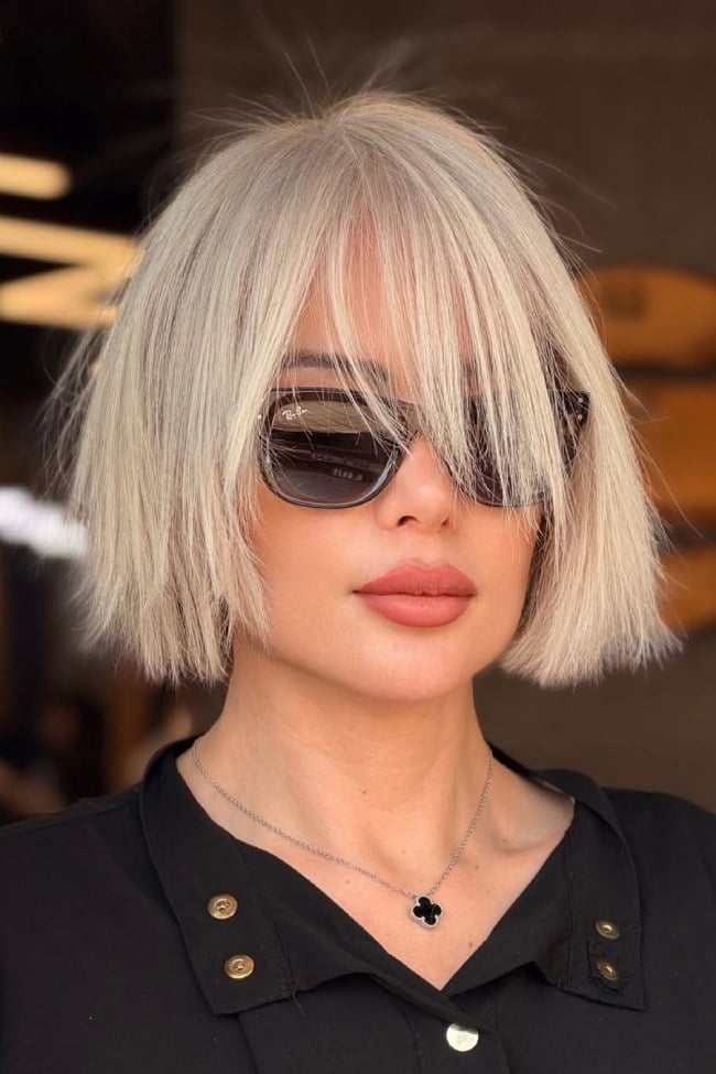 Platinum Blonde Blunt Bob With Curtain Bangs Platinum Blonde Blunt Bob With Curtain Bangs — Trendy Fine Hair
