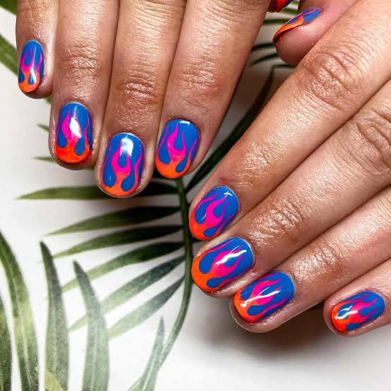 Short Oval Blue With Orange Pink Flame Design Short Oval Blue With Orange Pink Flame Design — Trendy Flame Nails