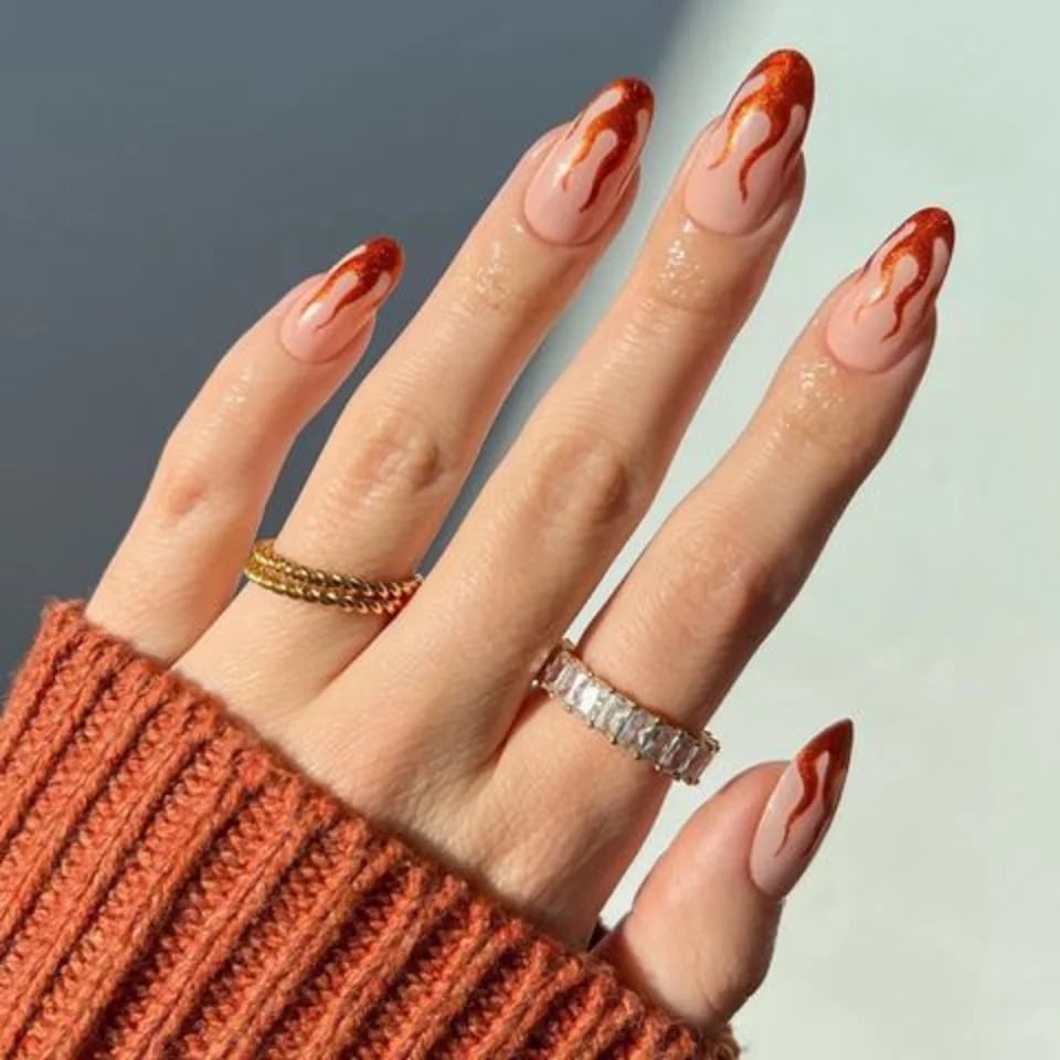 Long Stiletto Sheer Nude With Shimmering Flame Art Long Stiletto Sheer Nude With Shimmering Flame Art — Trendy Flame Nails