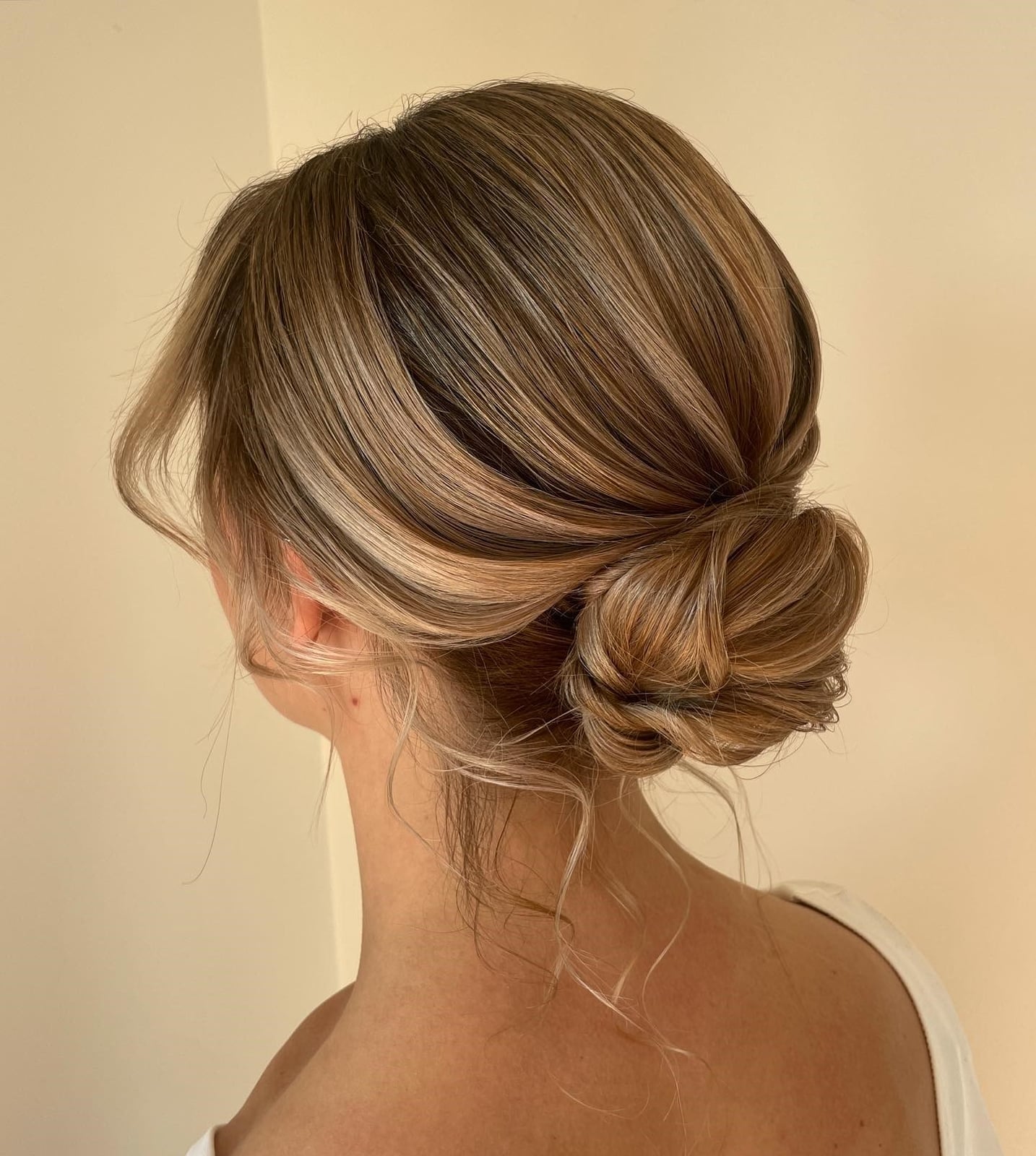 Loose Low Updo With Wavy Brown Highlights, Close-Up Take Loose Low Updo With Wavy Brown Highlights, Close-Up Take — Trendy Formal Updos