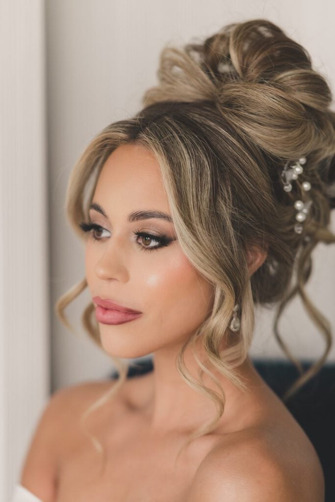 High Updo With Soft Face-Framing Curls High Updo With Soft Face-Framing Curls — Trendy Formal Updos
