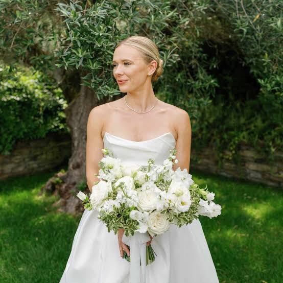Classic Blonde Low Bun With Side Part Classic Blonde Low Bun With Side Part — Trendy Formal Updos