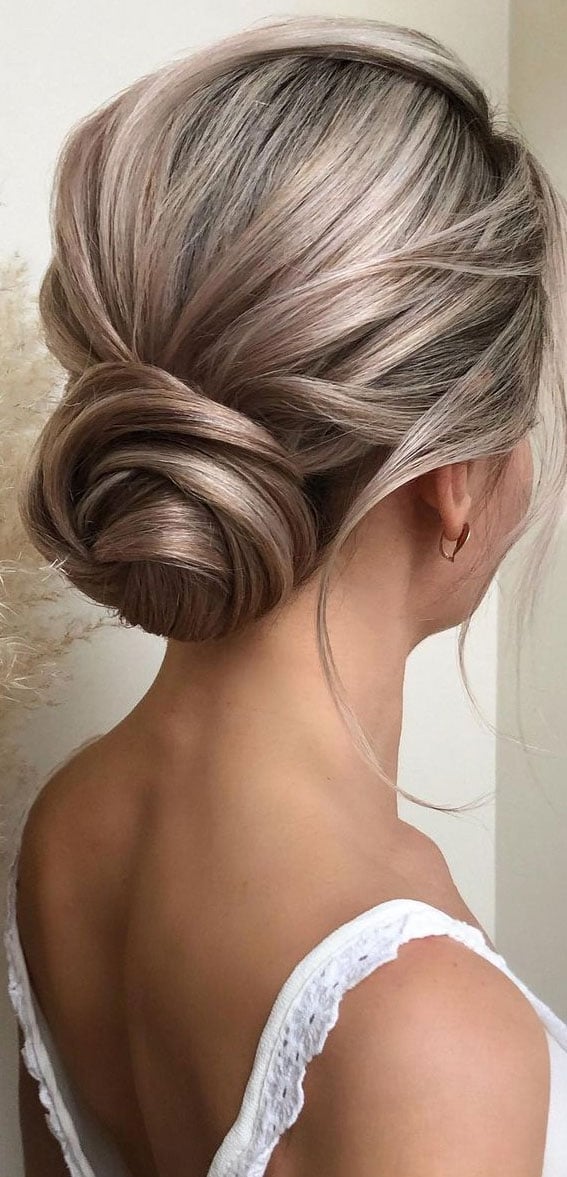 Ash Blonde Sleek Low Bun With Twist Ash Blonde Sleek Low Bun With Twist — Trendy Formal Updos
