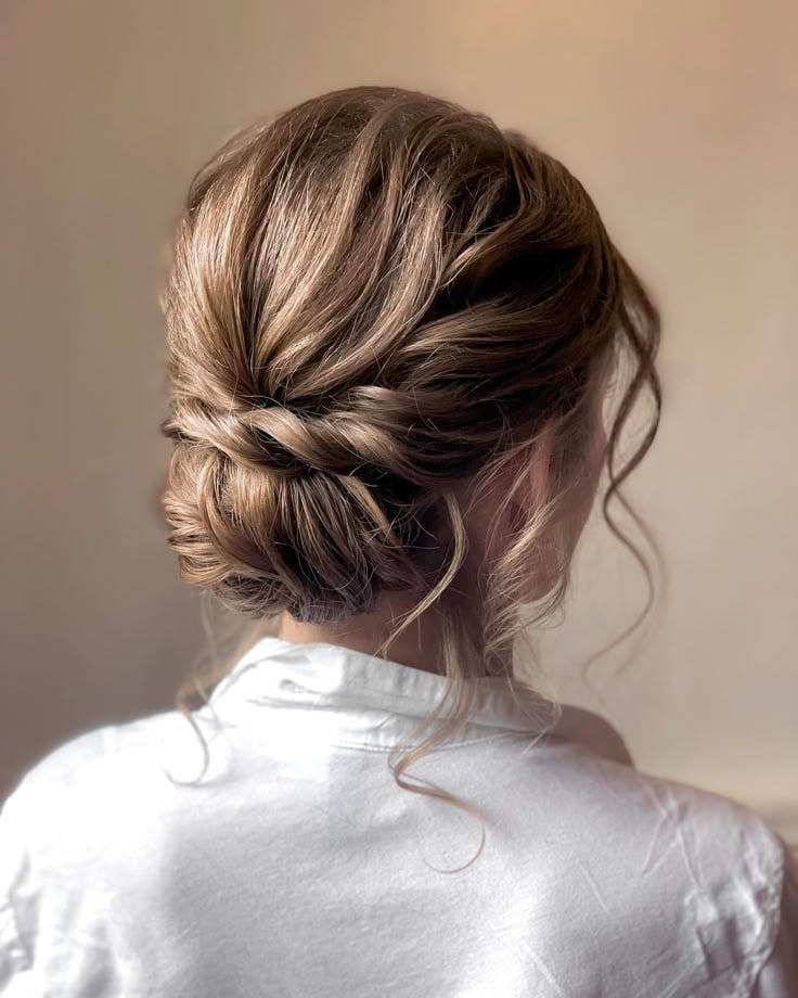 Textured Volume Updo With Face-Framing Pieces Textured Volume Updo With Face-Framing Pieces — Trendy Formal Updos