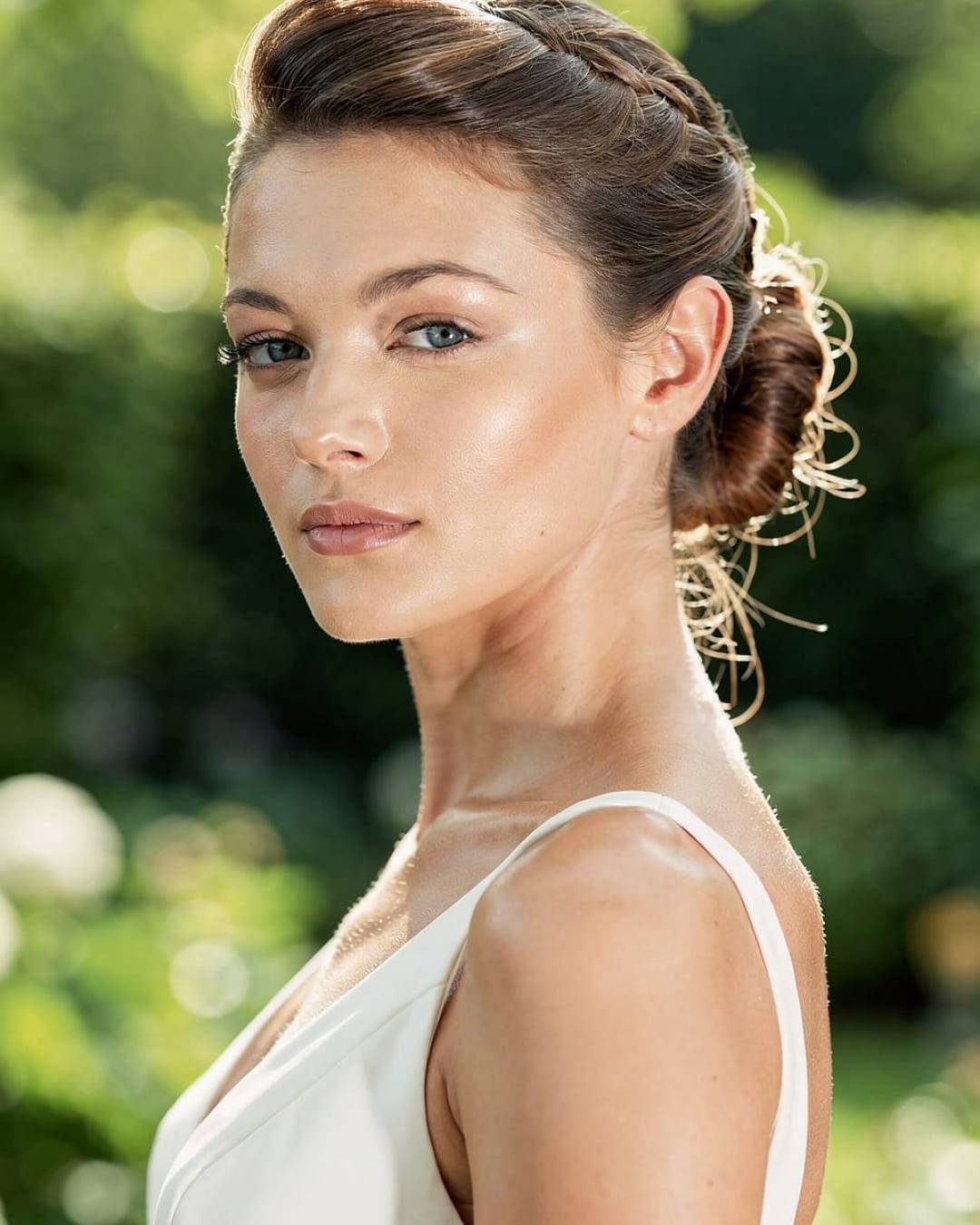 Braided Updo With Wavy Brown Highlights Braided Updo With Wavy Brown Highlights — Trendy Formal Updos