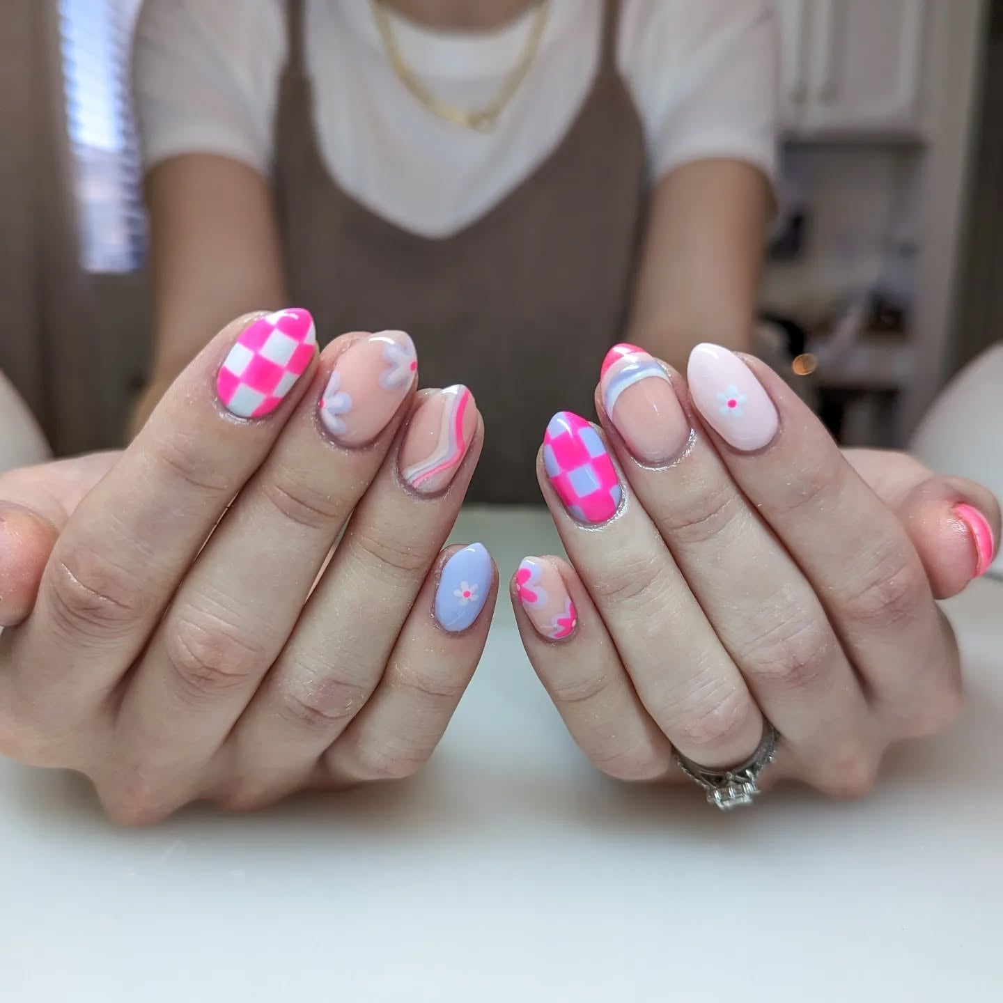 Short Oval Nails With Checkered And Floral Art Short Oval Nails With Checkered And Floral Art — Trendy Gender Reveal Nails