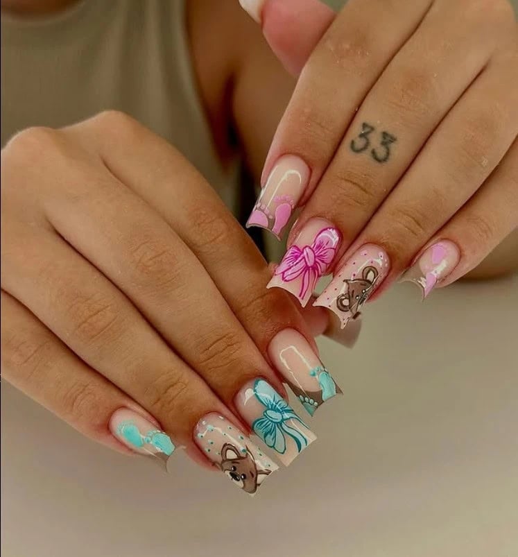 Medium Almond Nude With Gold Hearts Medium Almond Nude With Gold Hearts — Trendy Gender Reveal Nails