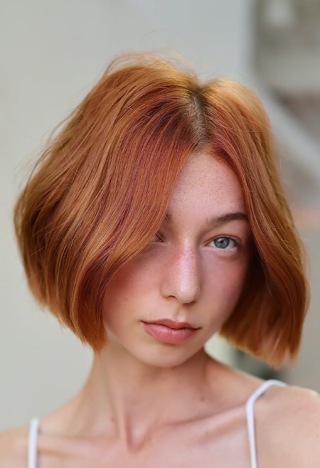 Chin Length Wavy Bob With Blunt Bangs Chin Length Wavy Bob With Blunt Bangs — Trendy Ginger Hair Color