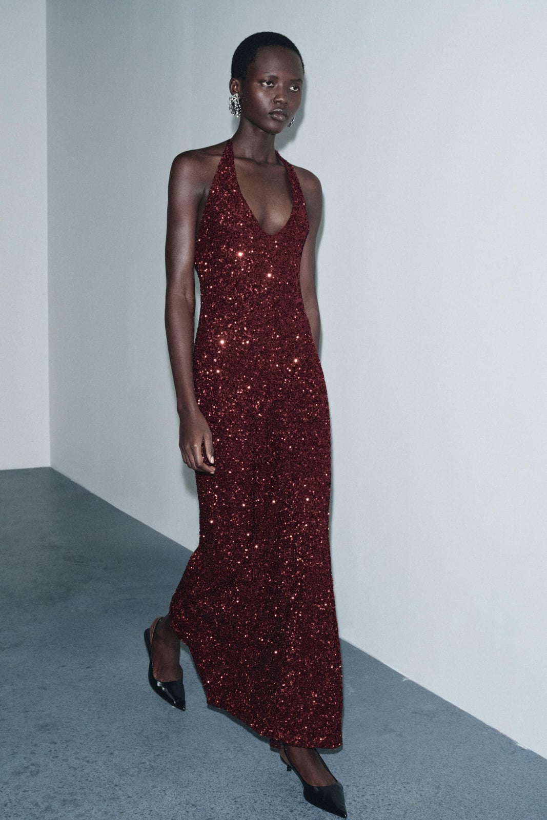 Deep Red Halter Neck Sequin Maxi Dress With Black Pointed Flats — Trendy Glitter Dresses