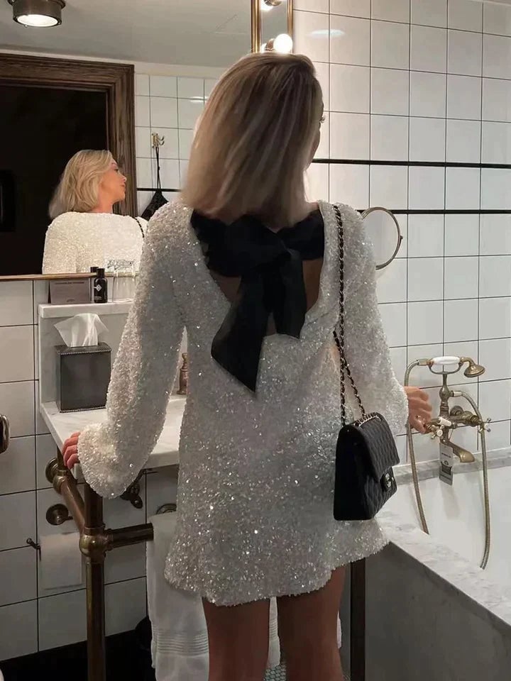 White Sequin Mini Dress With Black Bow Detail — Trendy Glitter Dresses