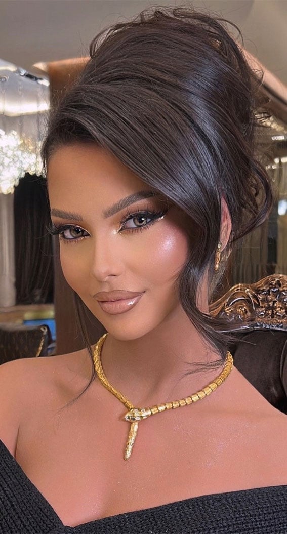 Voluminous Dark Brown Updo With Wispy Bangs Voluminous Dark Brown Updo With Wispy Bangs — Trendy Going Out Hairstyles