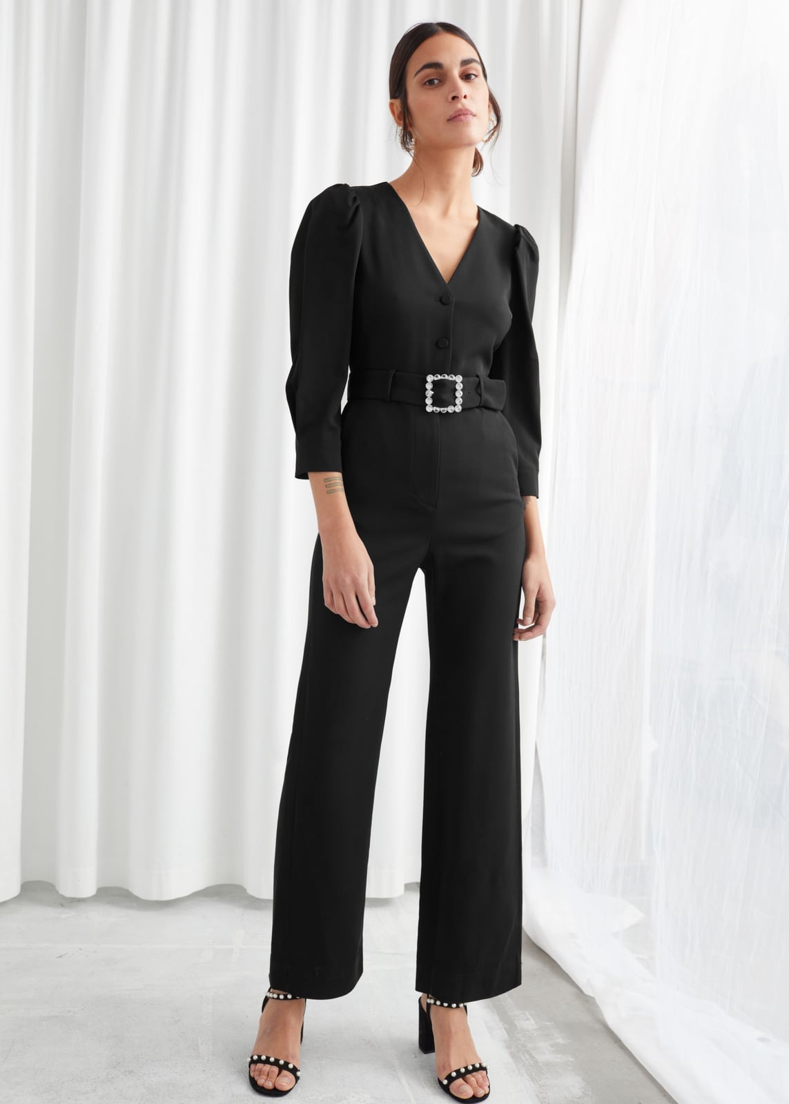 Black Wide-Leg Jumpsuit with Puff Sleeves and Buckle Belt Black Wide-Leg Jumpsuit with Puff Sleeves and Buckle Belt — Trendy Going Out Outfits Night Club