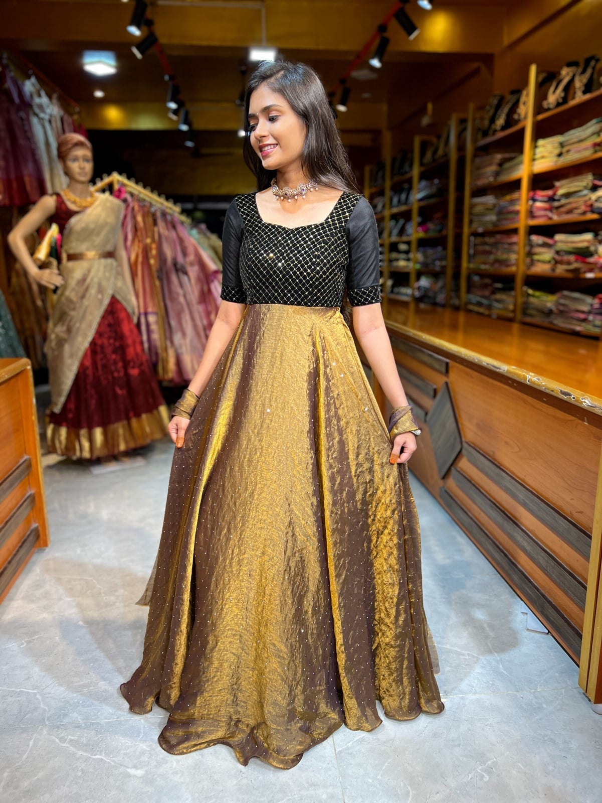 Black Sequined Bodice with Voluminous Gold Metallic, Close-Up Take — Trendy Gold Outfits