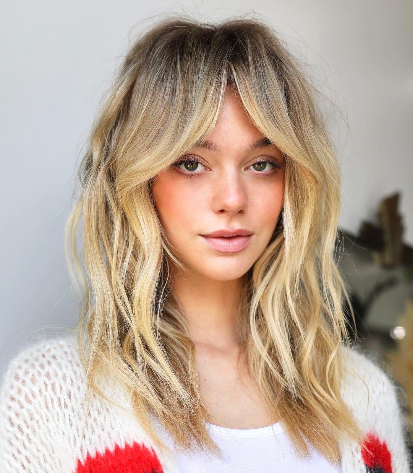 Collarbone Layered Golden Blonde With Curtain Bangs Collarbone Layered Golden Blonde With Curtain Bangs — Trendy Golden Blonde