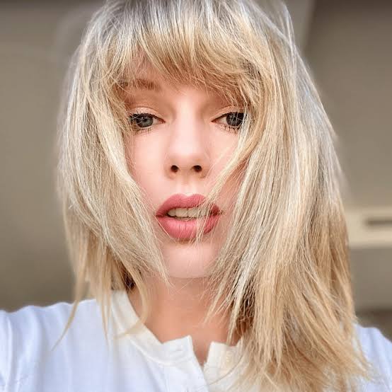 Blonde Shoulder Length Shag With Natural Texture — Trendy Hairstyles for Thick Hair