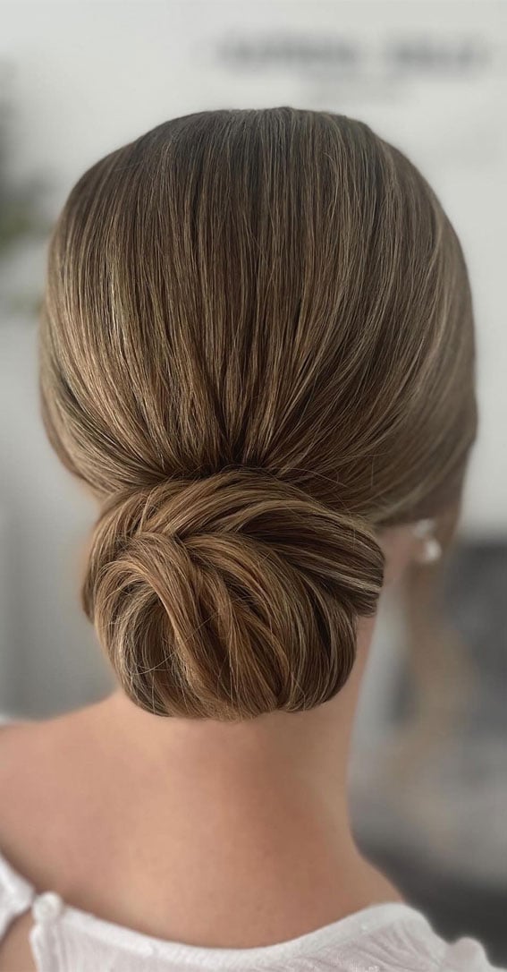 Sleek Low Bun With Subtle Highlights Sleek Low Bun With Subtle Highlights — Trendy Hairstyles to Do
