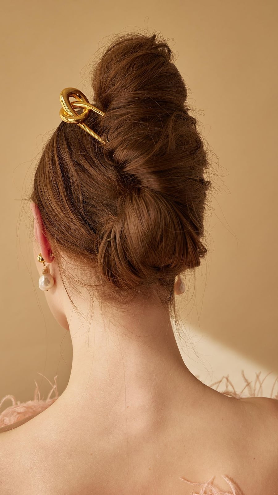 Medium Brown High Bun With Textured Twists — Trendy High Bun Hairstyles