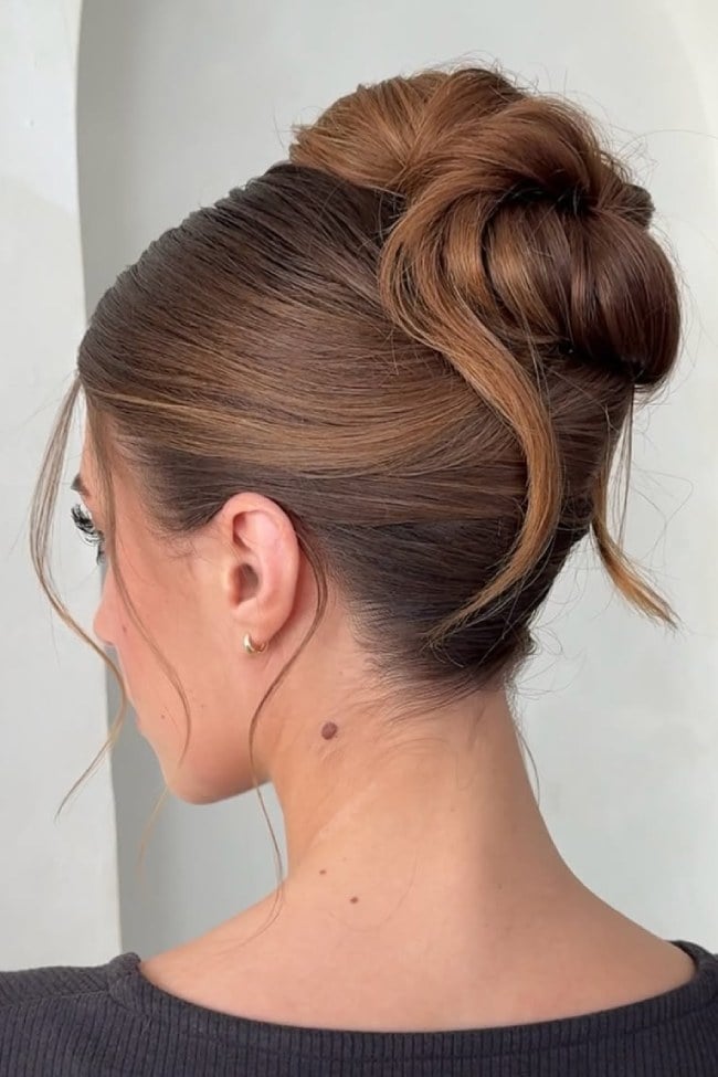 Sleek Sculpted Brown Bun — Trendy High Bun Hairstyles