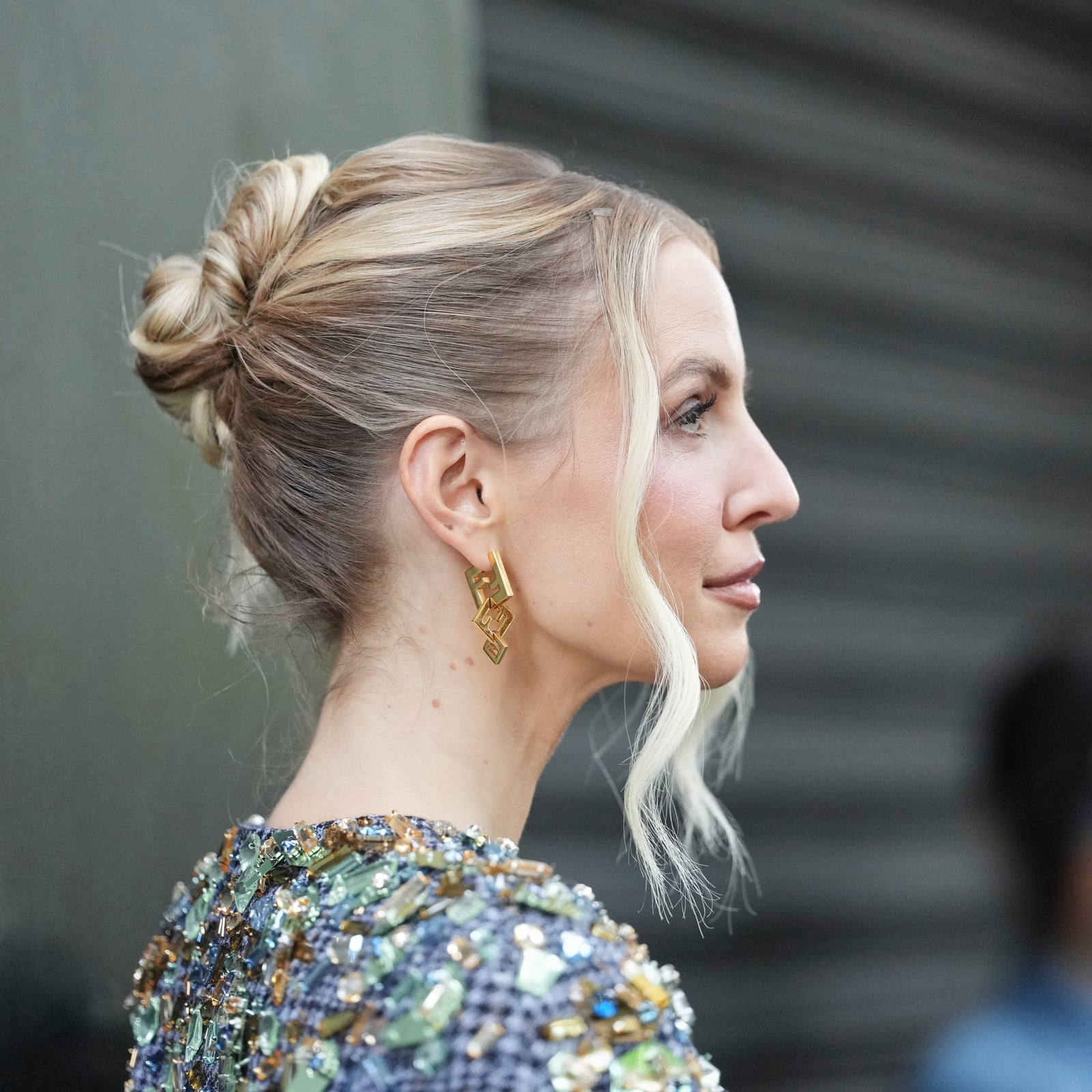 Elegant Blonde Updo With Wispy Curtain Bangs — Trendy High Bun Hairstyles