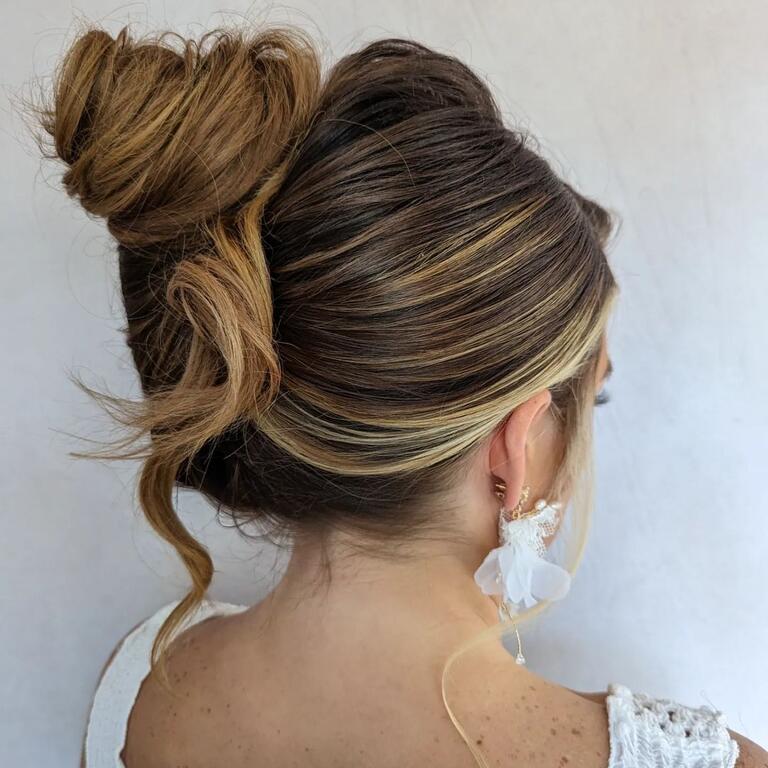 High Voluminous Updo With Dark Brown Blonde Highlights — Trendy High Bun Hairstyles