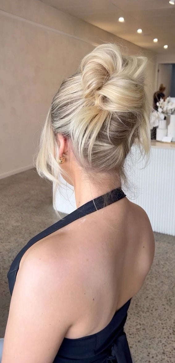 Ash Blonde Undone Bun With Root Shadow — Trendy High Bun Hairstyles