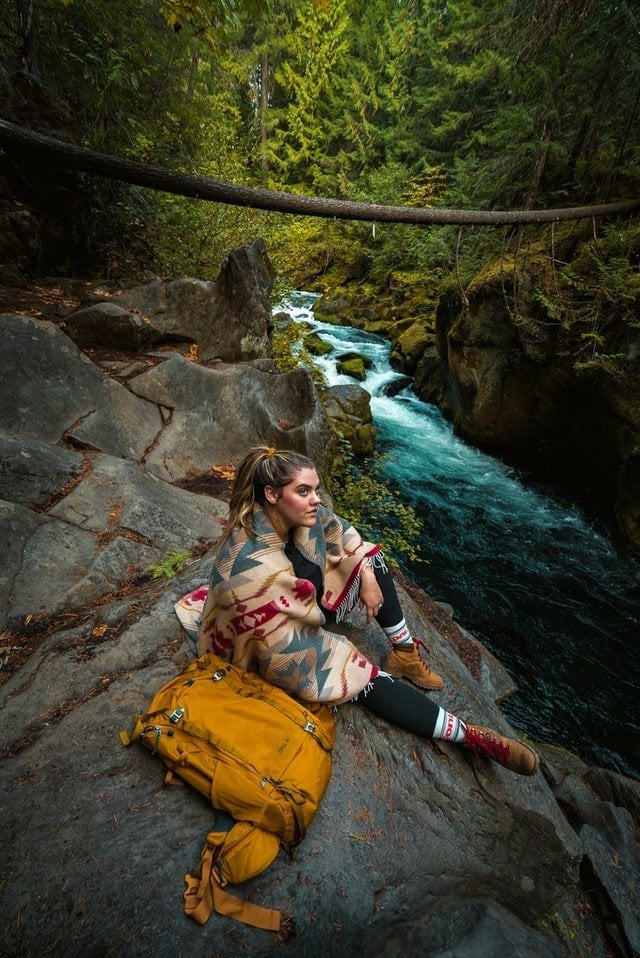 Geometric Print Poncho Over Black Base Layer Geometric Print Poncho Over Black Base Layer — Trendy Hiking Outfits