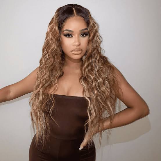 Mid-Back Balayage With Darker Base and Curtain Bangs Mid-Back Balayage With Darker Base and Curtain Bangs — Trendy Honey Blonde Balayage