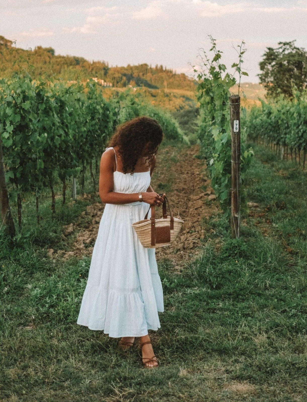 Tiered Light Blue Striped Midi Dress with Woven Bag — Trendy Italian Outfits