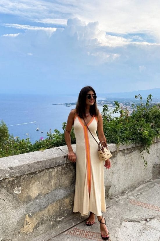Beige Knit Maxi Dress with Orange Trim and Black Flat Sandals Beige Knit Maxi Dress with Orange Trim and Black Flat Sandals — Trendy Italy Outfits